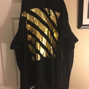 Black and gold hooded long sleeve shirt